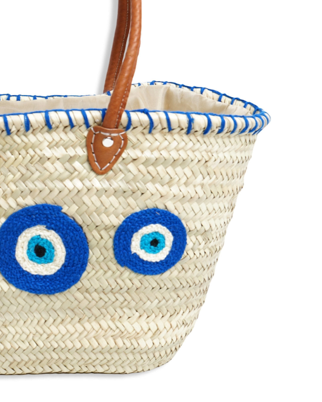 Carrycot with protective eyes · Natural palm and handmade leather