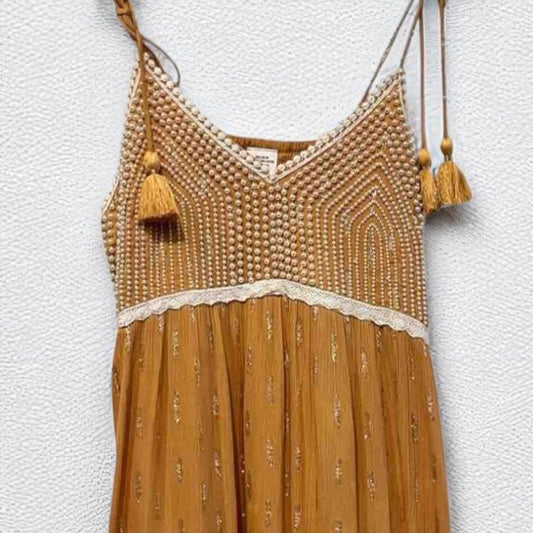 Vestido largo color tierra con crochet y bordado en el bajo