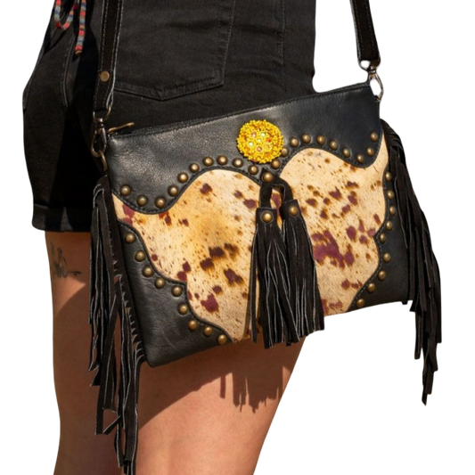Recycled leather clutch with fringes – Wild character, tribal essence