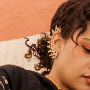 Handmade earcuff with mineral inlays